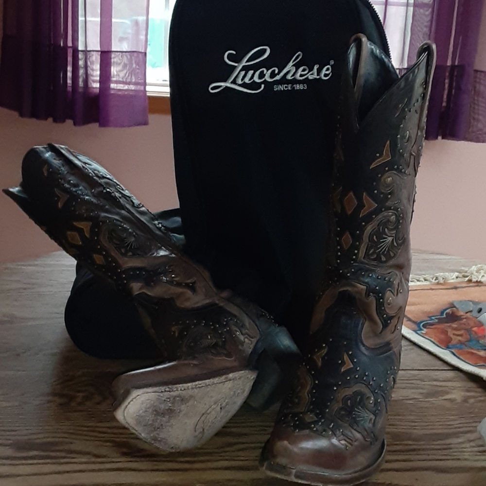 Lucchese pointed toe boots.